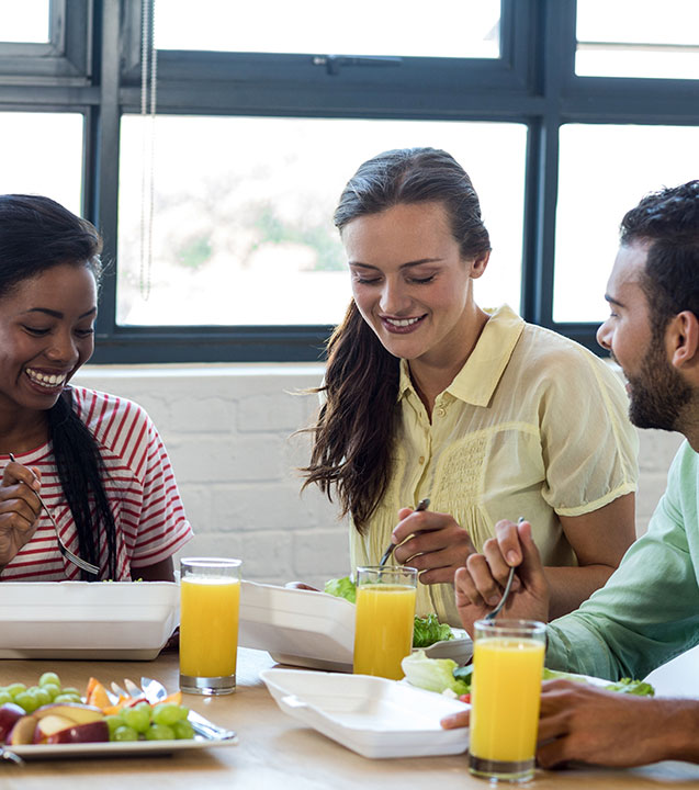 Employees enjoying a refreshing snack in their break room
